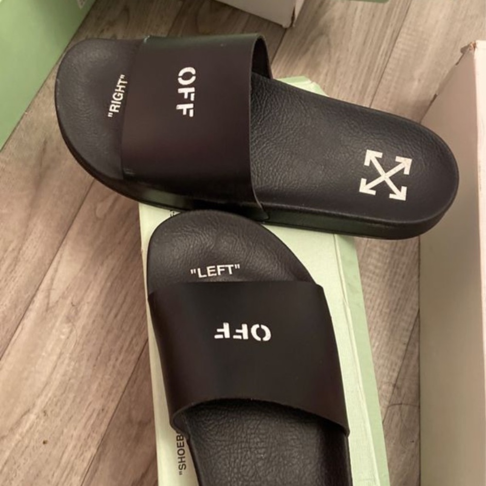 Off white pool slides.